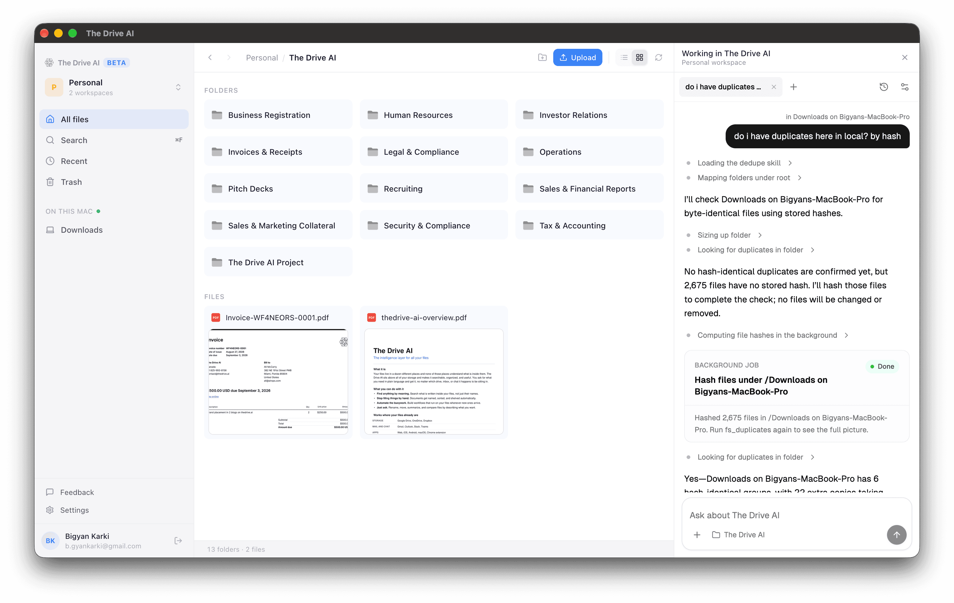 The Drive AI desktop app with workspace folders and the assistant finding duplicate files in Downloads